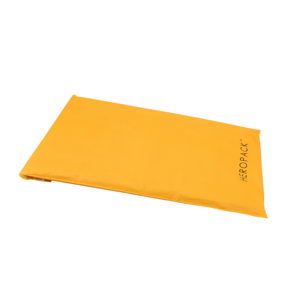 Angled yellow compostable HEROPACK mailer in medium size