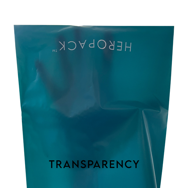 Teal HEROPACK compostable mailer showing transparency